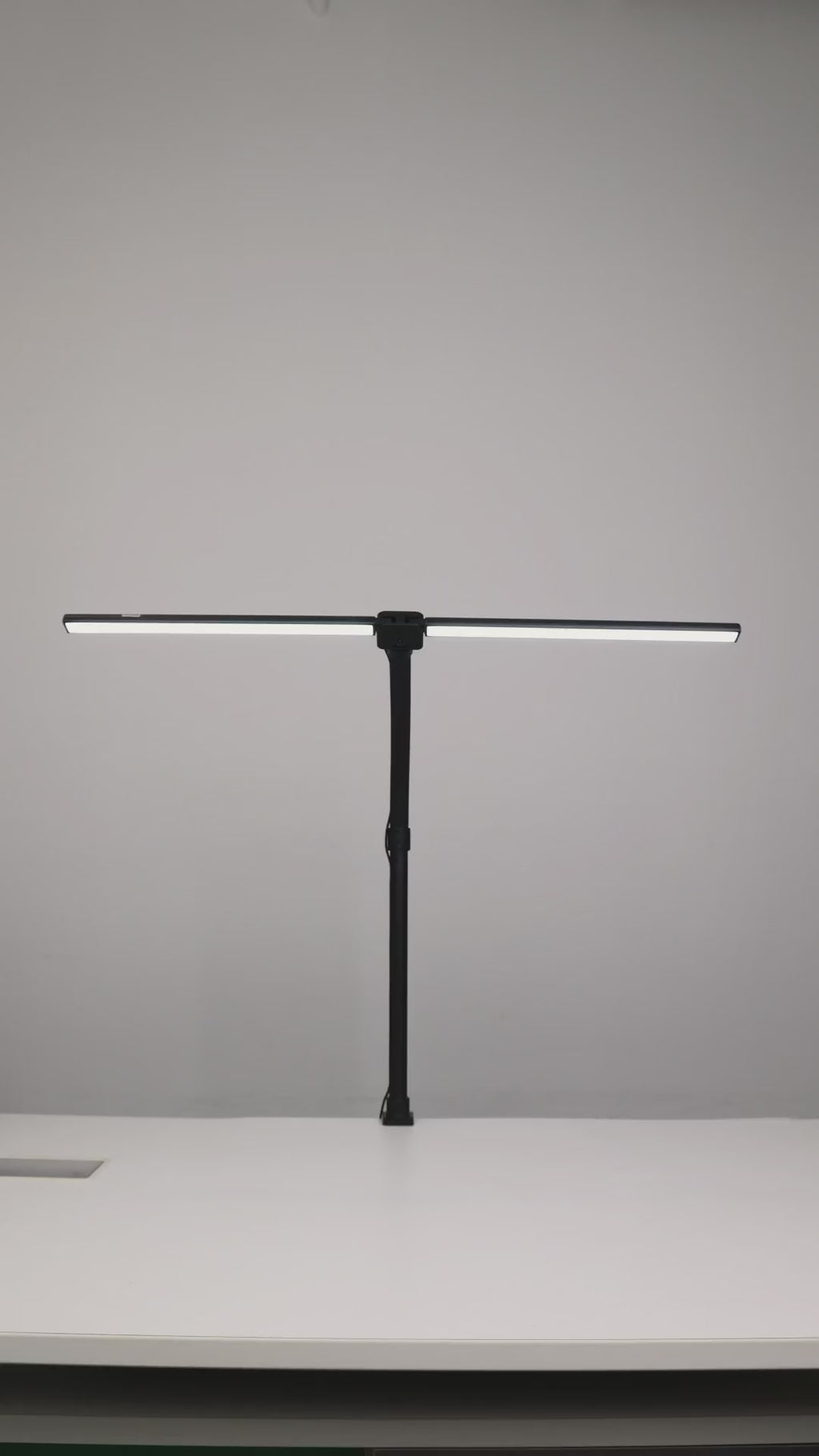 Nerius Axis Base desk lamp demonstration, showing adjustable head angles, flexible arm, 5 color temperature modes, and 5 brightness levels, used on office or home workspace
