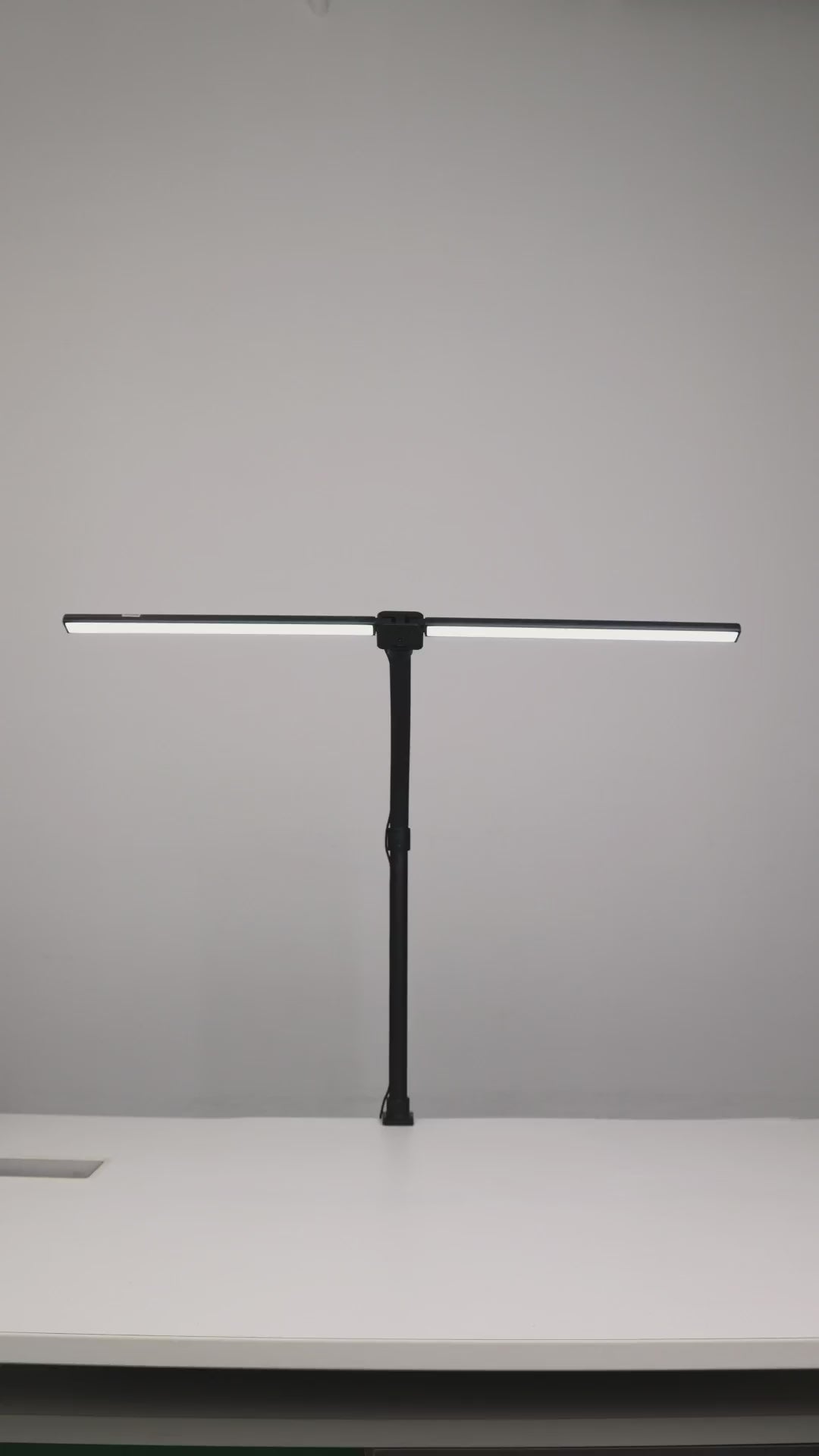 Nerius Axis Base desk lamp demonstration, showing adjustable head angles, flexible arm, 5 color temperature modes, and 5 brightness levels, used on office or home workspace